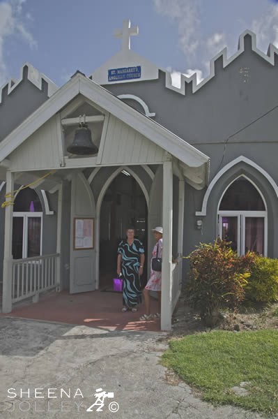Dressed for Church .jpg - Erlene Downie and her sister Oriel Farnum outside St. Margaret's Church